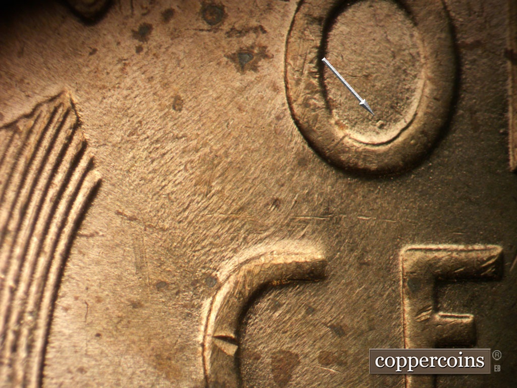 Die-stage B marker on 1955P•1DO•013 showing Die dot in lower O in ONE.