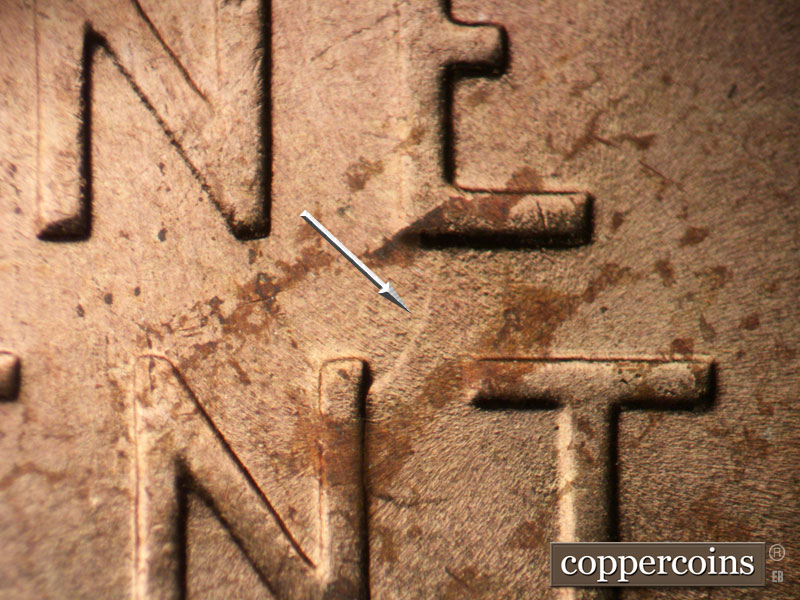 Die-stage B marker on 1955P•1DR•001 (1955 Doubled Die Reverse).