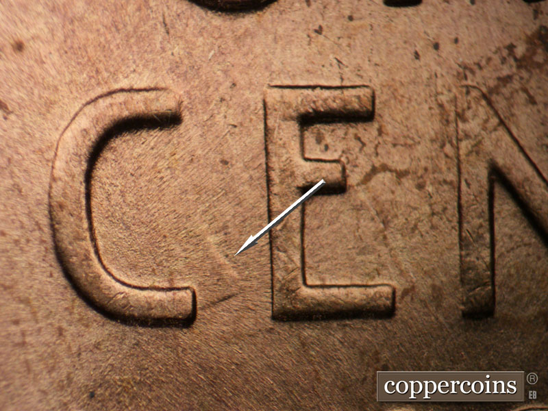 Die-stage B marker on 1955P•1DR•001 (1955 Doubled Die Reverse).