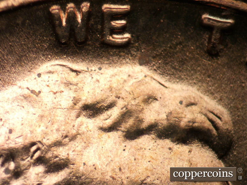 Die-stage B marker on 1955P•1DR•001 (1955 Doubled Die Reverse).