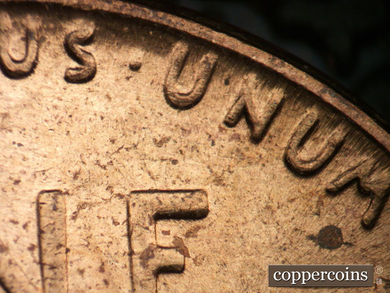 Die-stage C marker on 1955P•1DR•001 (1955 Doubled Die Reverse).