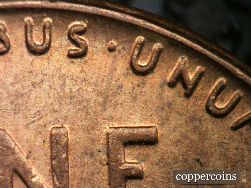 Die-stage B marker on 1955P•1DR•005 (1955 Doubled Die Reverse).