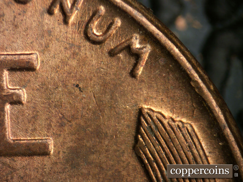 Die-stage B marker on 1955P•1DR•005 (1955 Doubled Die Reverse).