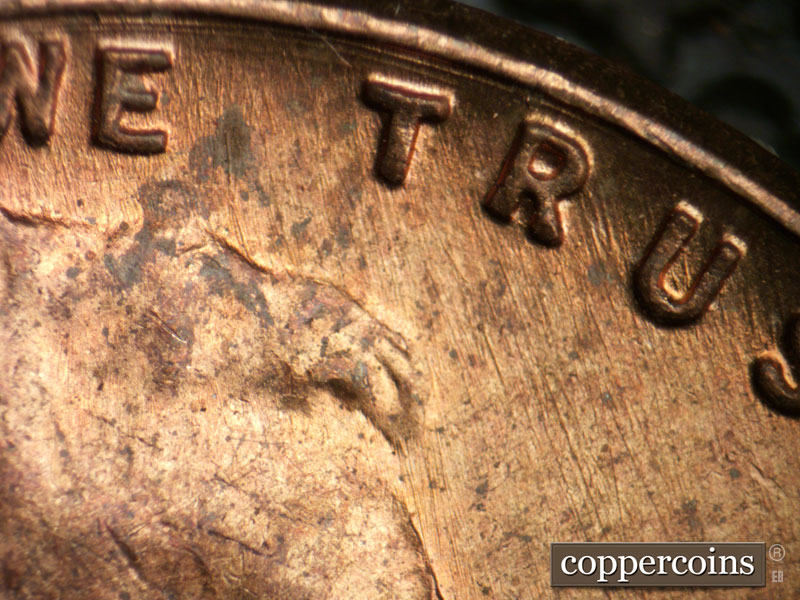 Die-stage B marker on 1955P•1DR•005 (1955 Doubled Die Reverse).