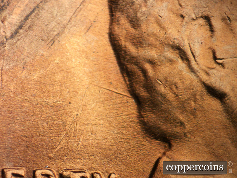 Die-stage C marker on 1955S•1DO•001 (1955 Doubled Die Obverse).