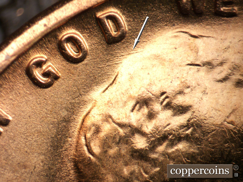 Die-stage B marker on 1955S•1DO•003 (1955 Doubled Die Obverse).