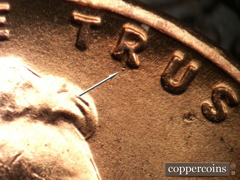 Die-stage B marker on 1955S•1DO•003 (1955 Doubled Die Obverse).