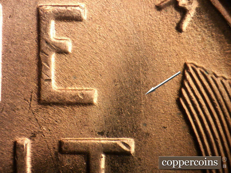 Die-stage B marker on 1955S•1DO•003 (1955 Doubled Die Obverse).