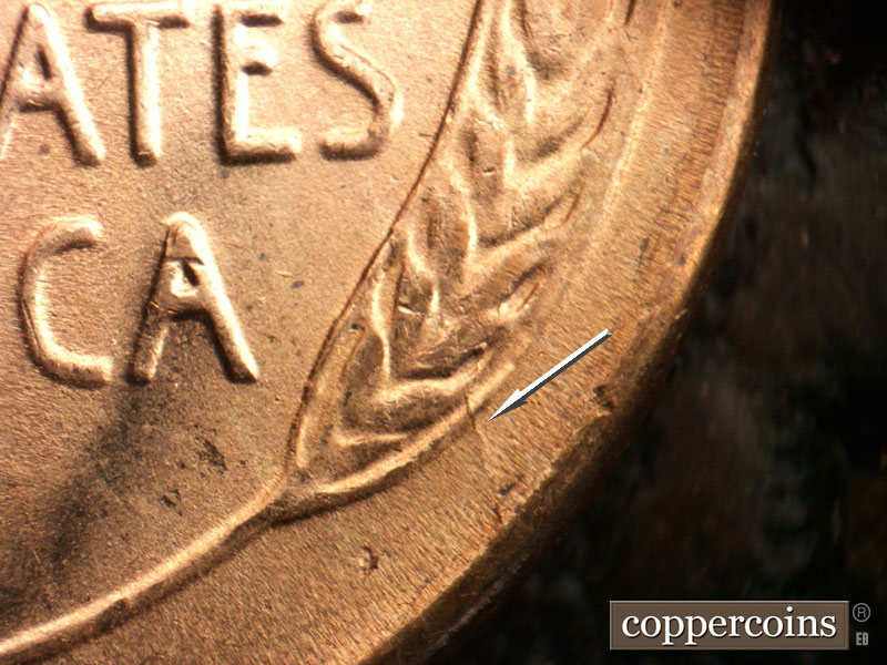 Die-stage B marker on 1955S•1DO•003 (1955 Doubled Die Obverse).