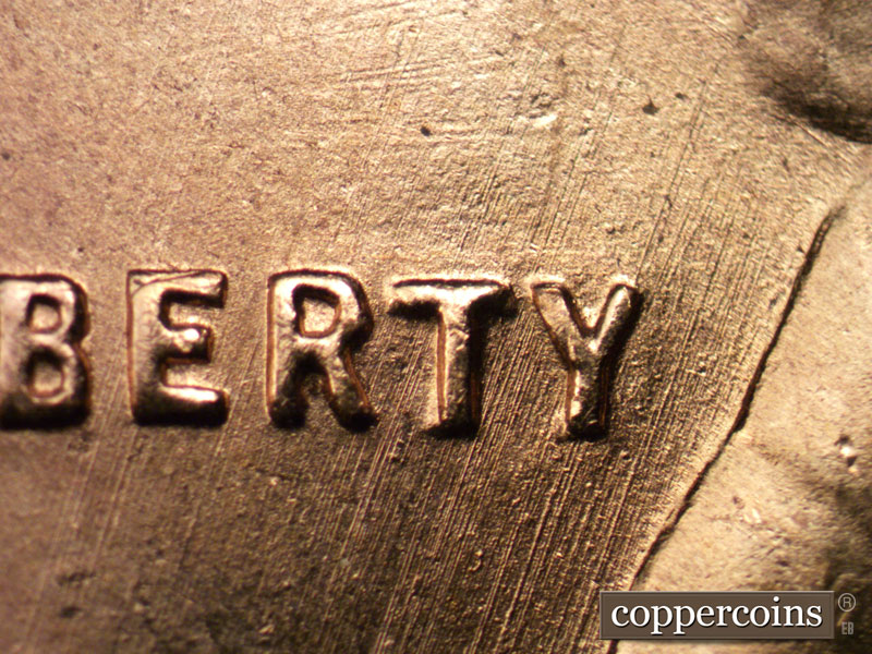 Die-stage B marker on 1955S•1MM•001 (1955 Repunched Mint Mark).