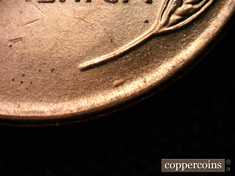 Die-stage B marker on 1955S•1MM•001 (1955 Repunched Mint Mark).