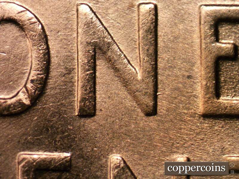 Die-stage B marker on 1955S•1MM•001 (1955 Repunched Mint Mark).