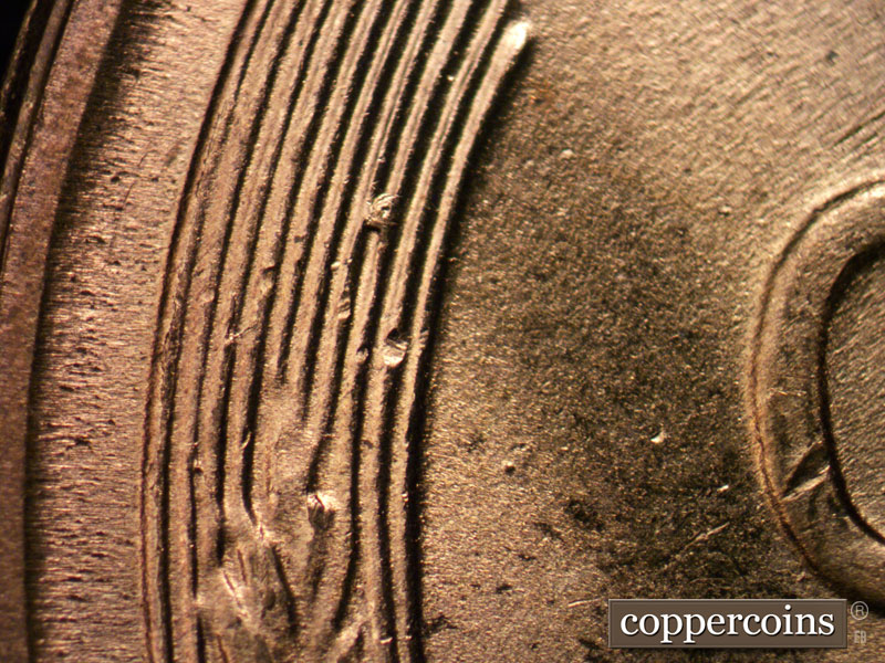 Die-stage B marker on 1955S•1MM•001 (1955 Repunched Mint Mark).