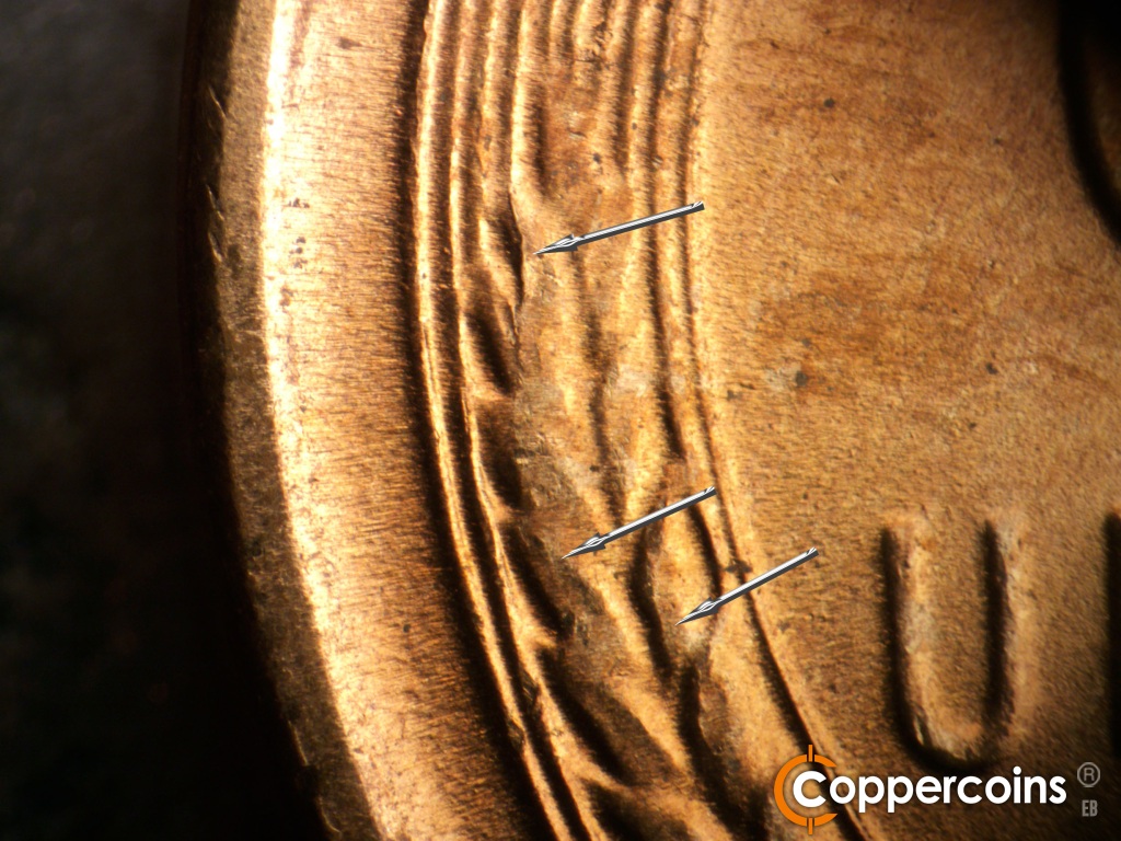 Die-stage D marker on 1955S•1MM•002 showing Die crack down left wheat stem has progressed.
