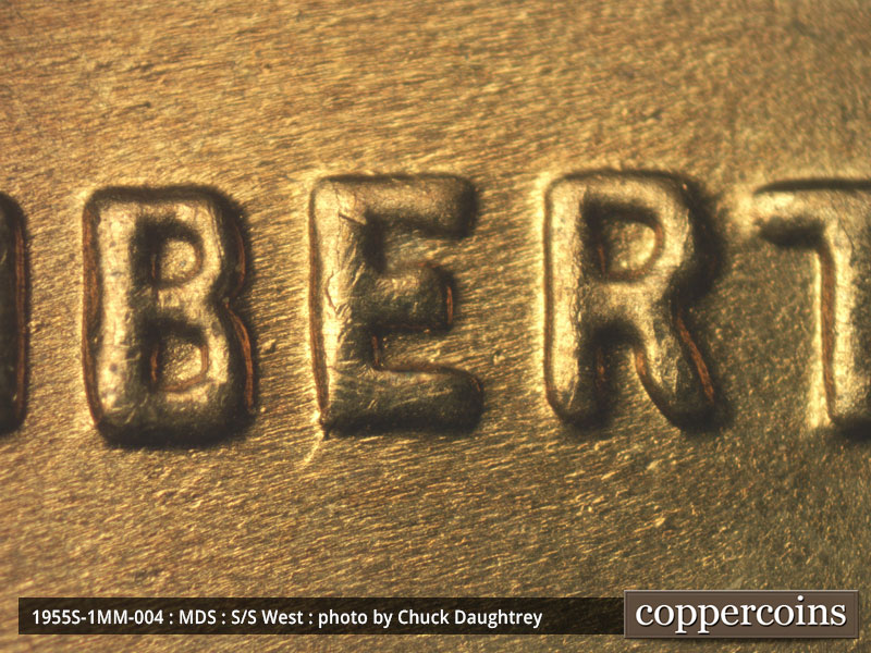 Die-stage B marker on 1955S•1MM•004 (1955 Repunched Mint Mark).