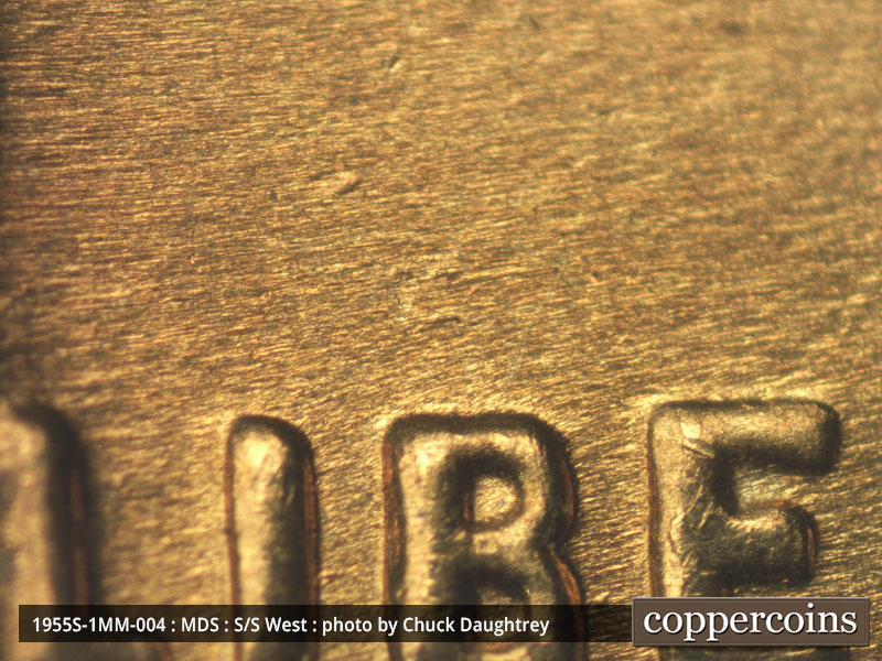 Die-stage B marker on 1955S•1MM•004 (1955 Repunched Mint Mark).