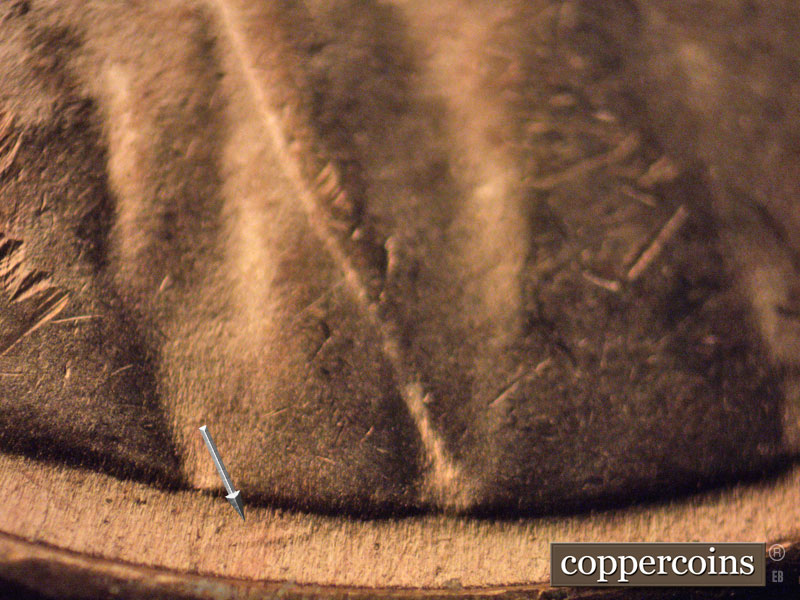 Die-stage B marker on 1955S•1MM•005 (1955 Repunched Mint Mark).