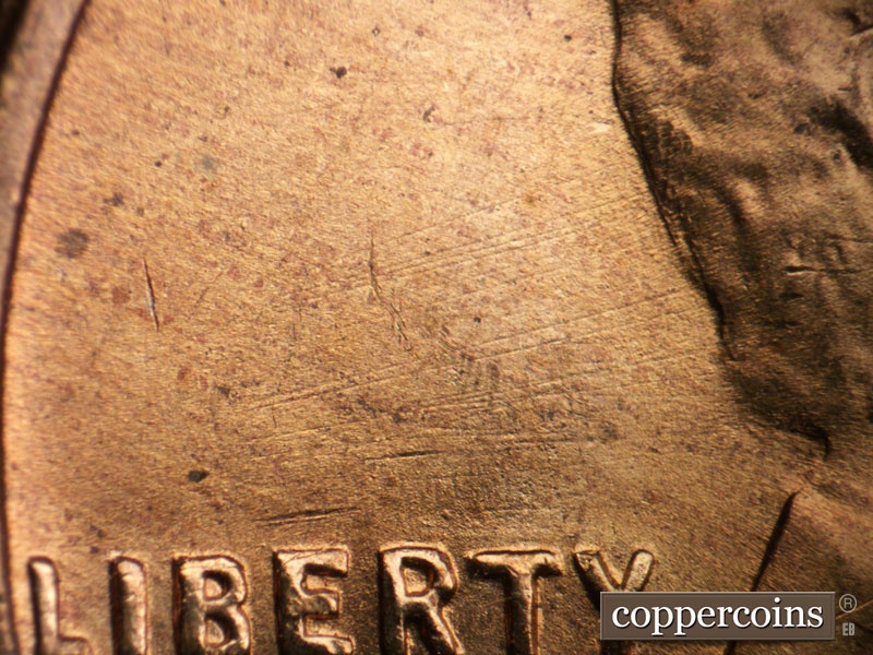 Die-stage B marker on 1955S•1MM•007 (1955 Repunched Mint Mark).