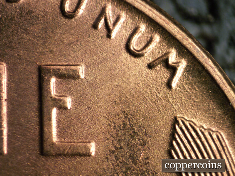 Die-stage B marker on 1955S•1MM•010 (1955 Repunched Mint Mark).