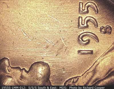 Die-stage B marker on 1955S•1MM•012 (1955 Repunched Mint Mark).