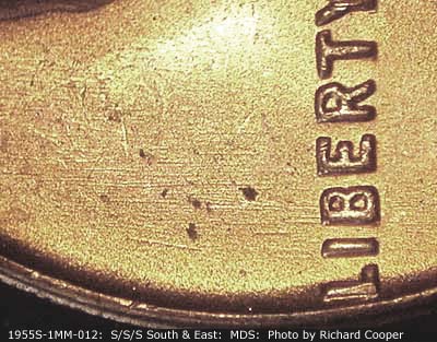 Die-stage B marker on 1955S•1MM•012 (1955 Repunched Mint Mark).