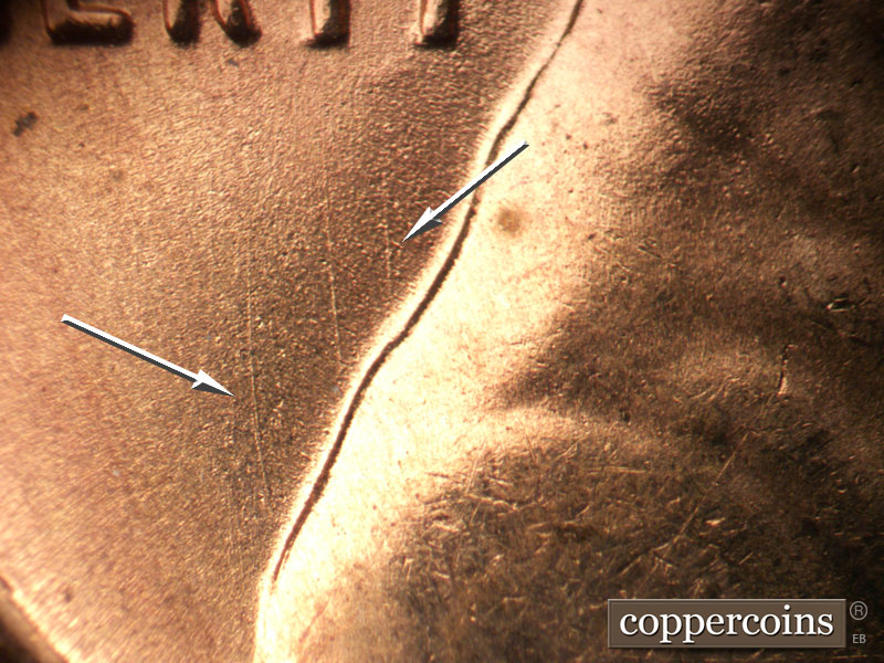 Die-stage B marker on 1955S•1MM•018 (1955 Repunched Mint Mark).