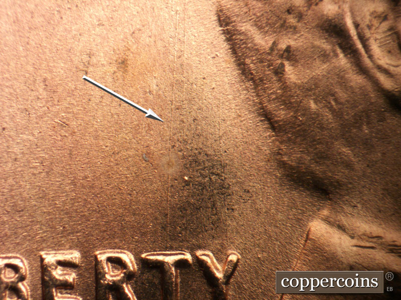 Die-stage B marker on 1955S•1MM•018 (1955 Repunched Mint Mark).