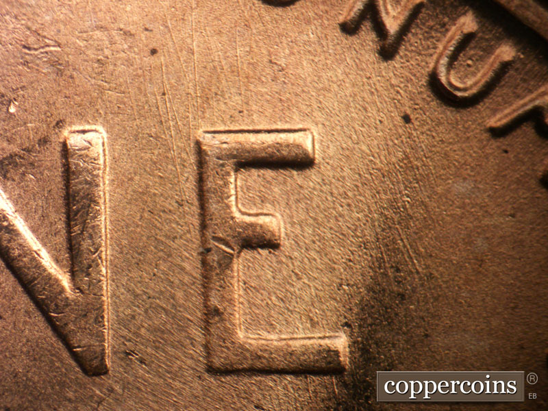 Die-stage B marker on 1955S•1MM•018 (1955 Repunched Mint Mark).