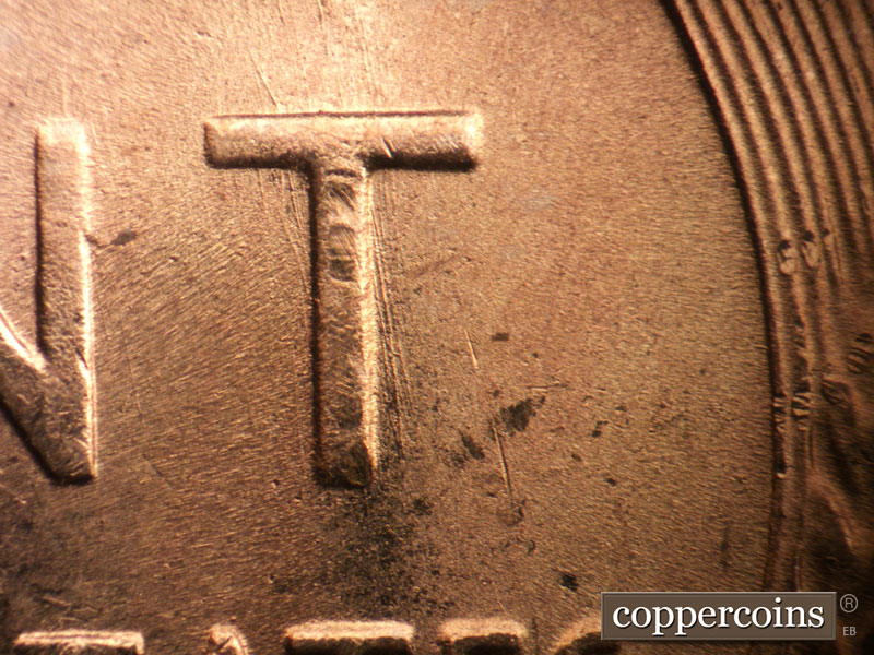 Die-stage B marker on 1955S•1MM•018 (1955 Repunched Mint Mark).