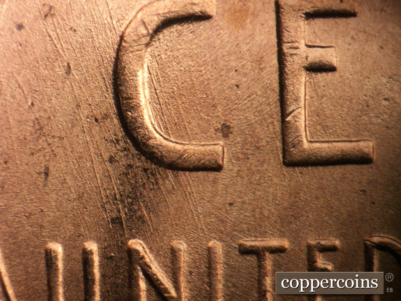 Die-stage B marker on 1955S•1MM•018 (1955 Repunched Mint Mark).