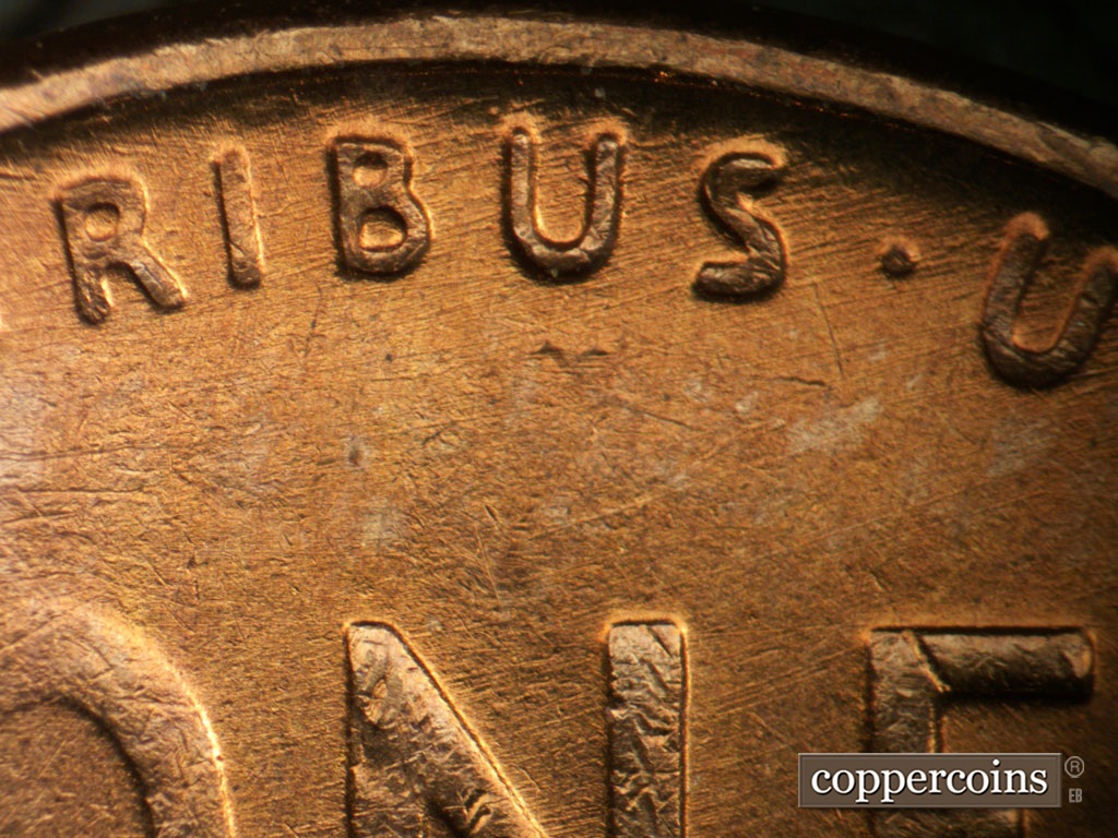 Die-stage B marker on 1955S•1MM•019 showing Die scratche through PLURIBUS and ONE.
