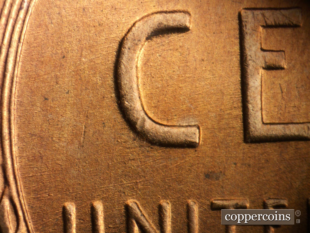 Die-stage B marker on 1955S•1MM•019 showing Light die scratches through C in CENT.