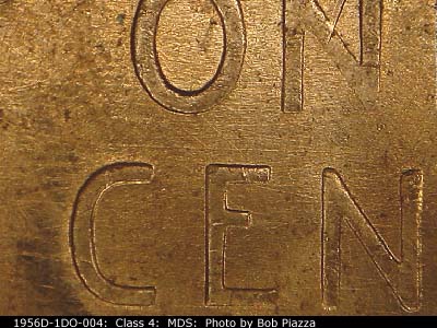 Die-stage B marker on 1956D•1DO•004 (1956 Doubled Die Obverse).