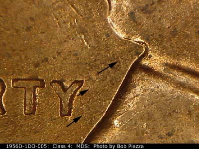 Die-stage B marker on 1956D•1DO•005 (1956 Doubled Die Obverse).