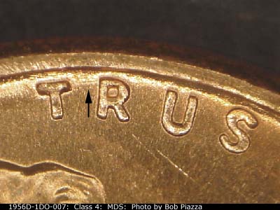 Die-stage B marker on 1956D•1DO•007 (1956 Doubled Die Obverse).