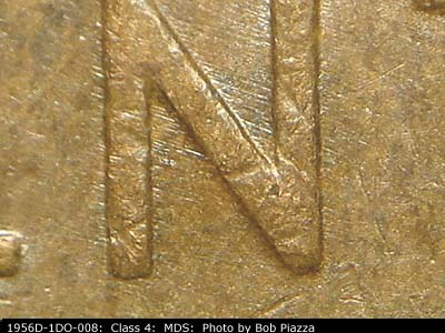 Die-stage B marker on 1956D•1DO•008 (1956 Doubled Die Obverse).