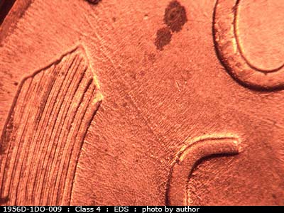 Die-stage A marker on 1956D•1DO•009 (1956 Doubled Die Obverse).