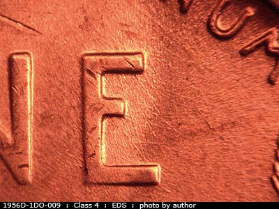 Die-stage A marker on 1956D•1DO•009 (1956 Doubled Die Obverse).