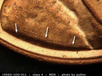Die-stage B marker on 1956D•1DO•011 (1956 Doubled Die Obverse).