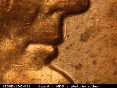 Die-stage B marker on 1956D•1DO•011 (1956 Doubled Die Obverse).