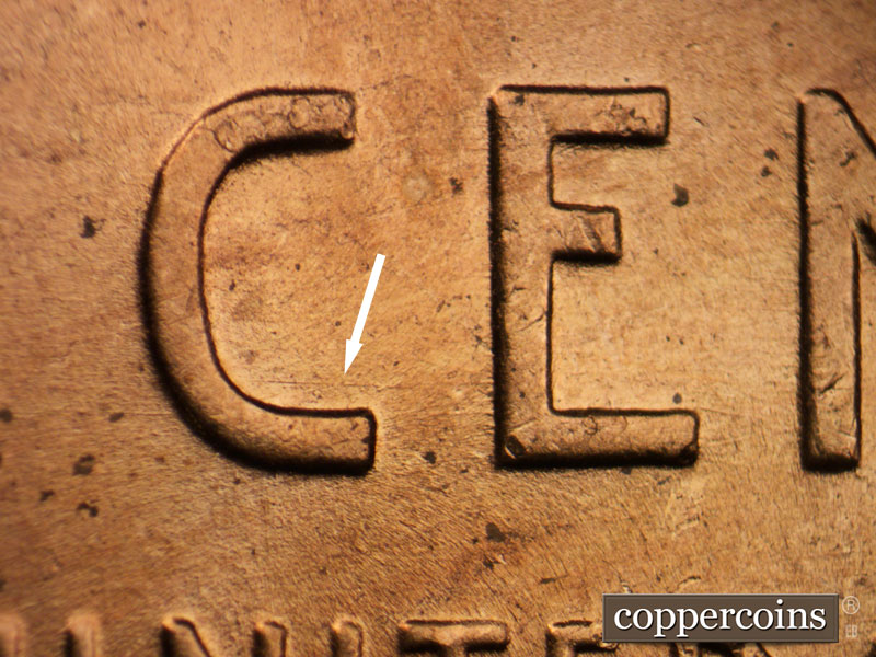 Die-stage B marker on 1956D•1DO•012 (1956 Doubled Die Obverse).