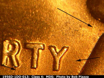 Die-stage A marker on 1956D•1DO•013 (1956 Doubled Die Obverse).