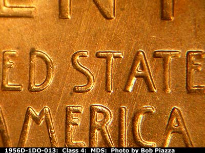 Die-stage A marker on 1956D•1DO•013 (1956 Doubled Die Obverse).