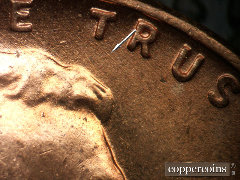 Die-stage B marker on 1956D•1DO•013 (1956 Doubled Die Obverse).