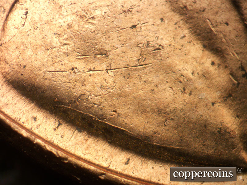 Die-stage C marker on 1956D•1DO•013 (1956 Doubled Die Obverse).
