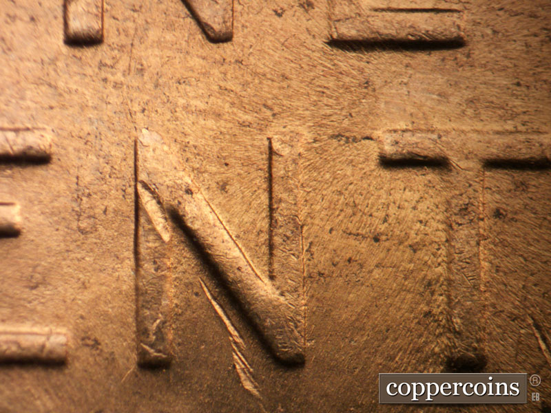 Die-stage C marker on 1956D•1DO•013 (1956 Doubled Die Obverse).