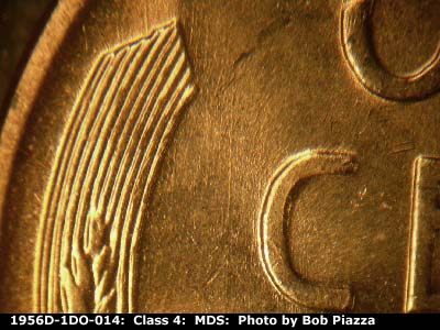 Die-stage B marker on 1956D•1DO•014 (1956 Doubled Die Obverse).
