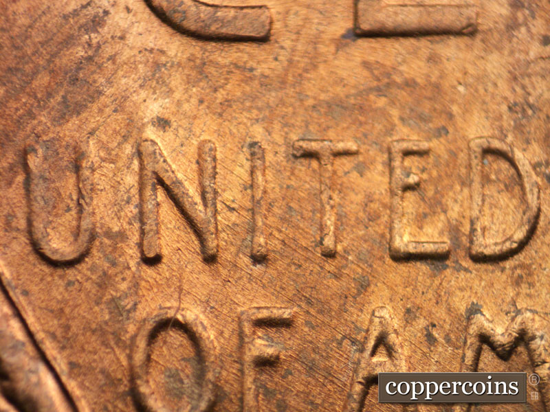 Die-stage B marker on 1956D•1DO•016 (1956 Doubled Die Obverse).