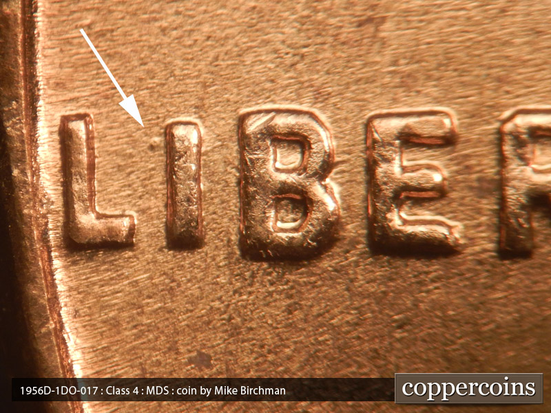 Die-stage B marker on 1956D•1DO•017 (1956 Doubled Die Obverse).