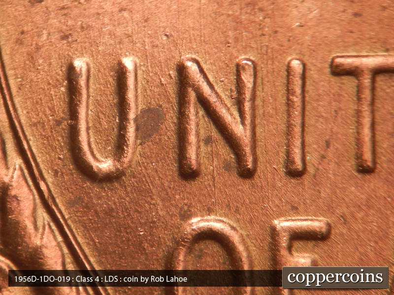 Die-stage C marker on 1956D•1DO•019 (1956 Doubled Die Obverse).